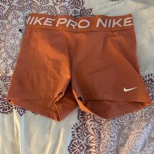 Nike Women's Burnt Orange Pro Athletic Shorts
